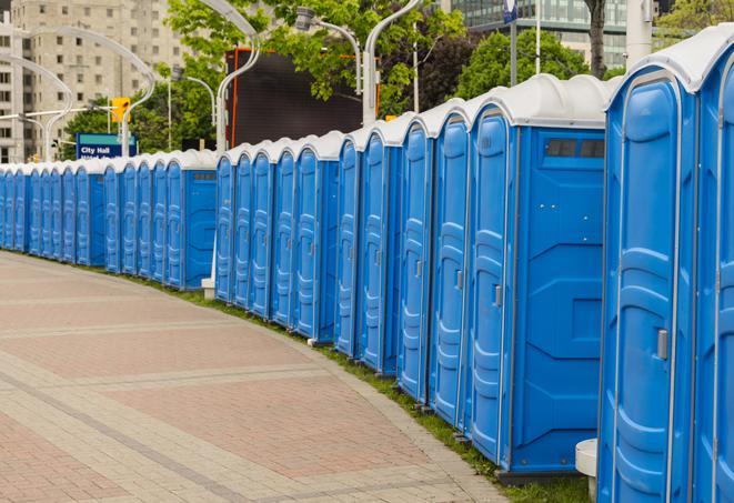 portable restrooms lined up at a marathon, ensuring runners can take a much-needed bathroom break in Centerville